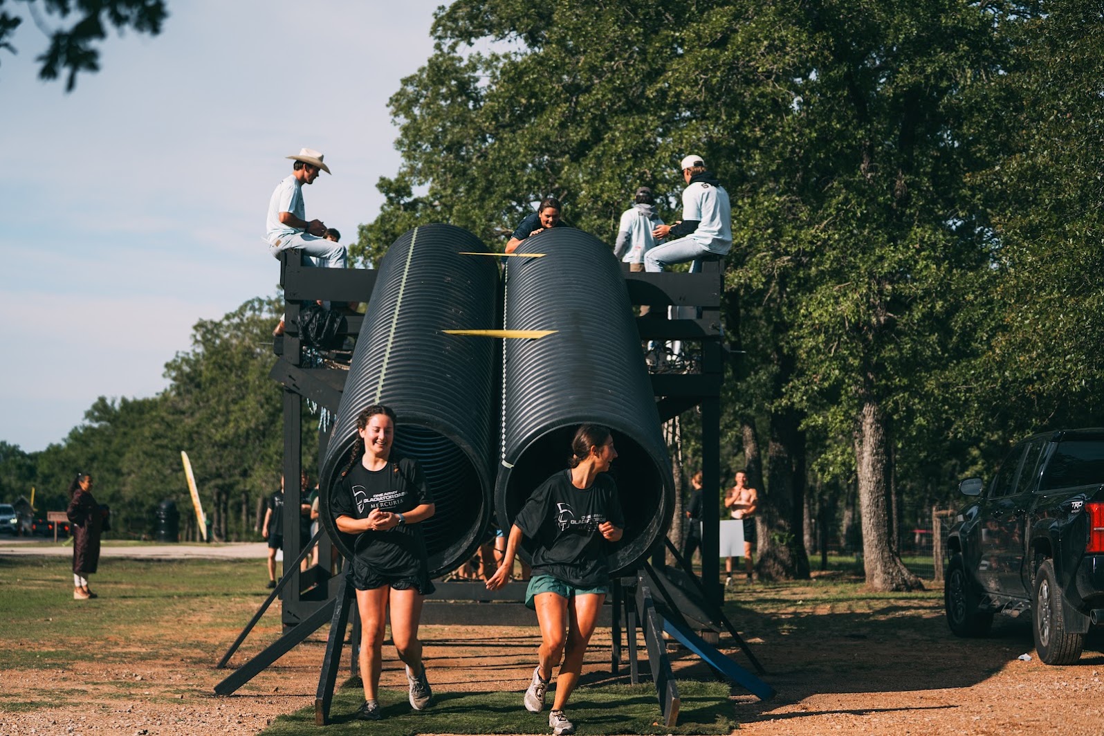 Racers completing the Cargo obstacle