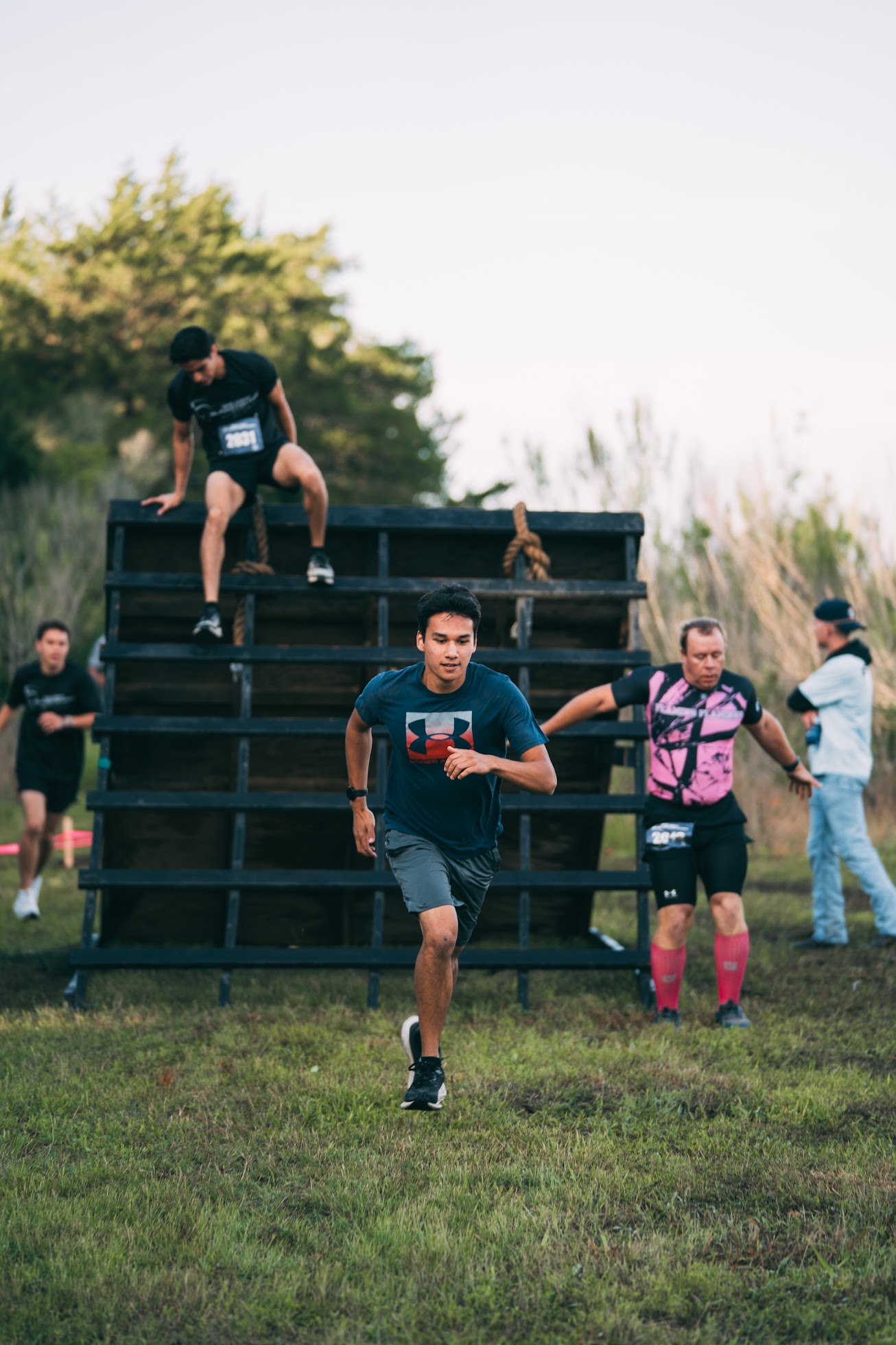 Racer completing the Summit obstacle